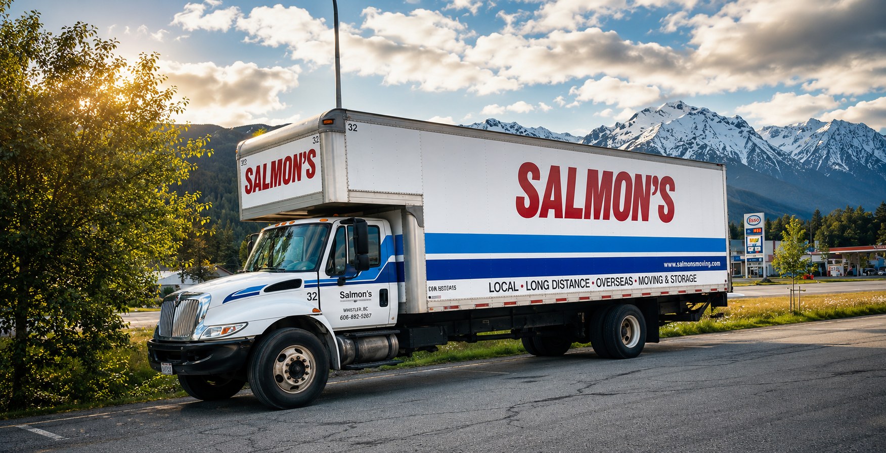 Salmon's Moving and Storage truck parked on a BC highway with mountains behind